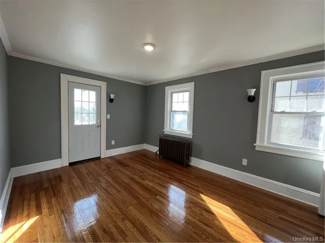 a view of an empty room and window
