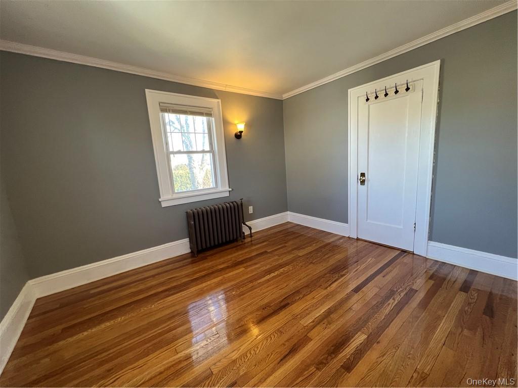85 Locust Avenue Scarsdale, NY 10583 - Photo 31 of 38 a view of empty room with wooden floor and fan