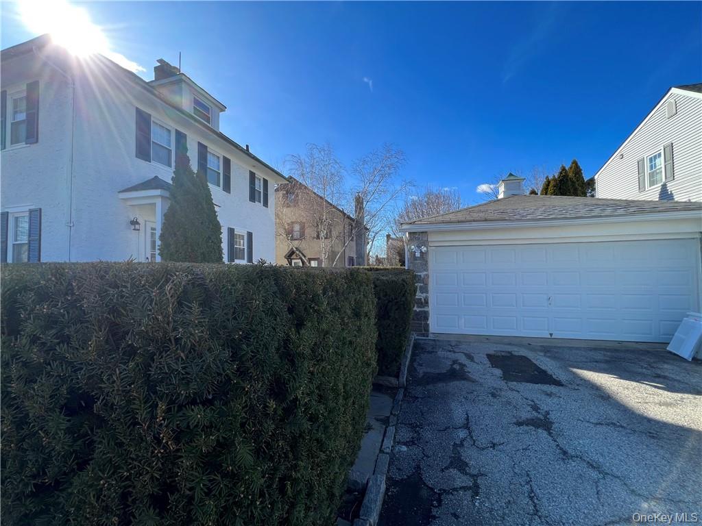 85 Locust Avenue Scarsdale, NY 10583 - Photo 8 of 38 a view of a house with a yard