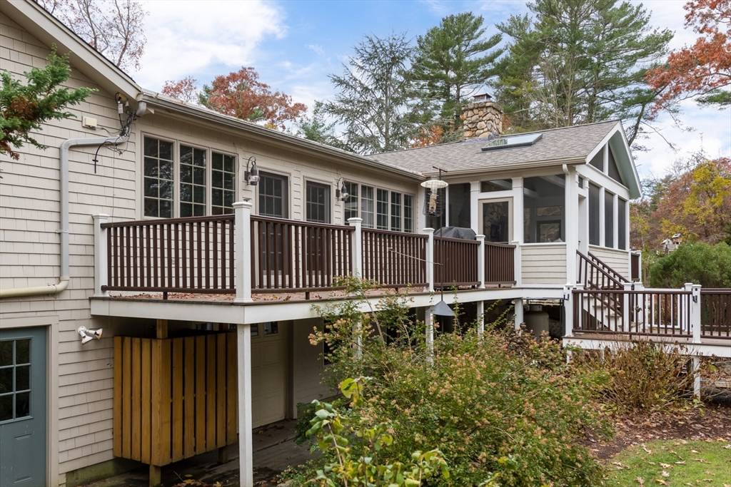 15 Parlowtown Road, Unit A Marion, MA 02738 - Photo 5 of 16 a front view of a house with a deck