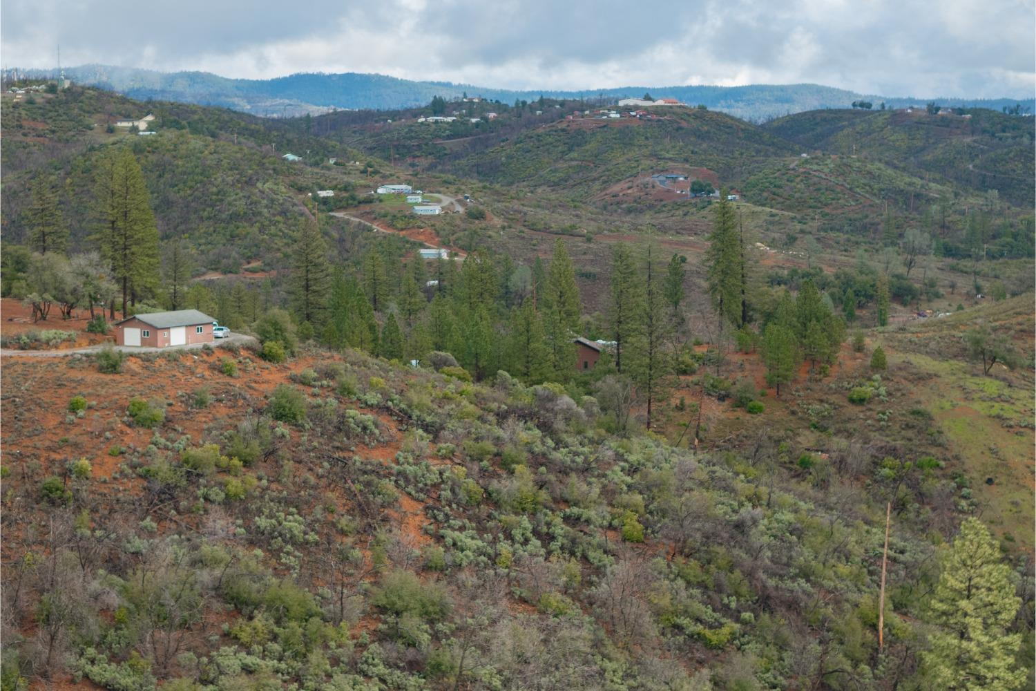 9080 El Dorado Trail Mountain Ranch, CA 95246 - Photo 47 of 48 a view of a town with mountains in the background