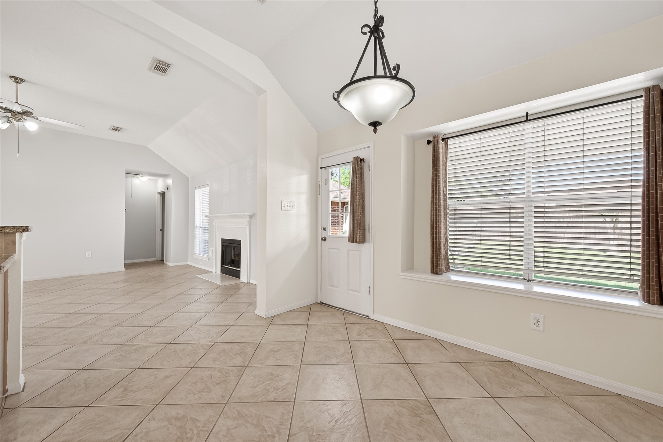 20839 Rivershire Lane Houston, TX 77073 - Photo 17 of 50 a view of an empty room with a window
