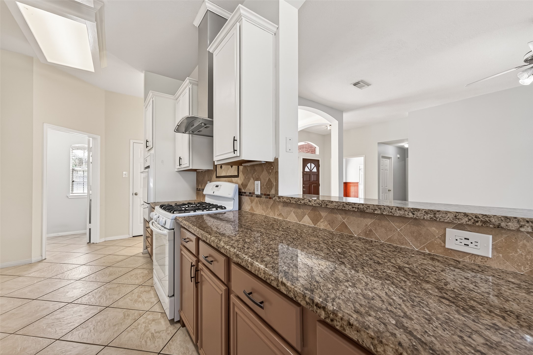 20839 Rivershire Lane Houston, TX 77073 - Photo 18 of 50 a kitchen with stainless steel appliances granite countertop a sink and cabinets