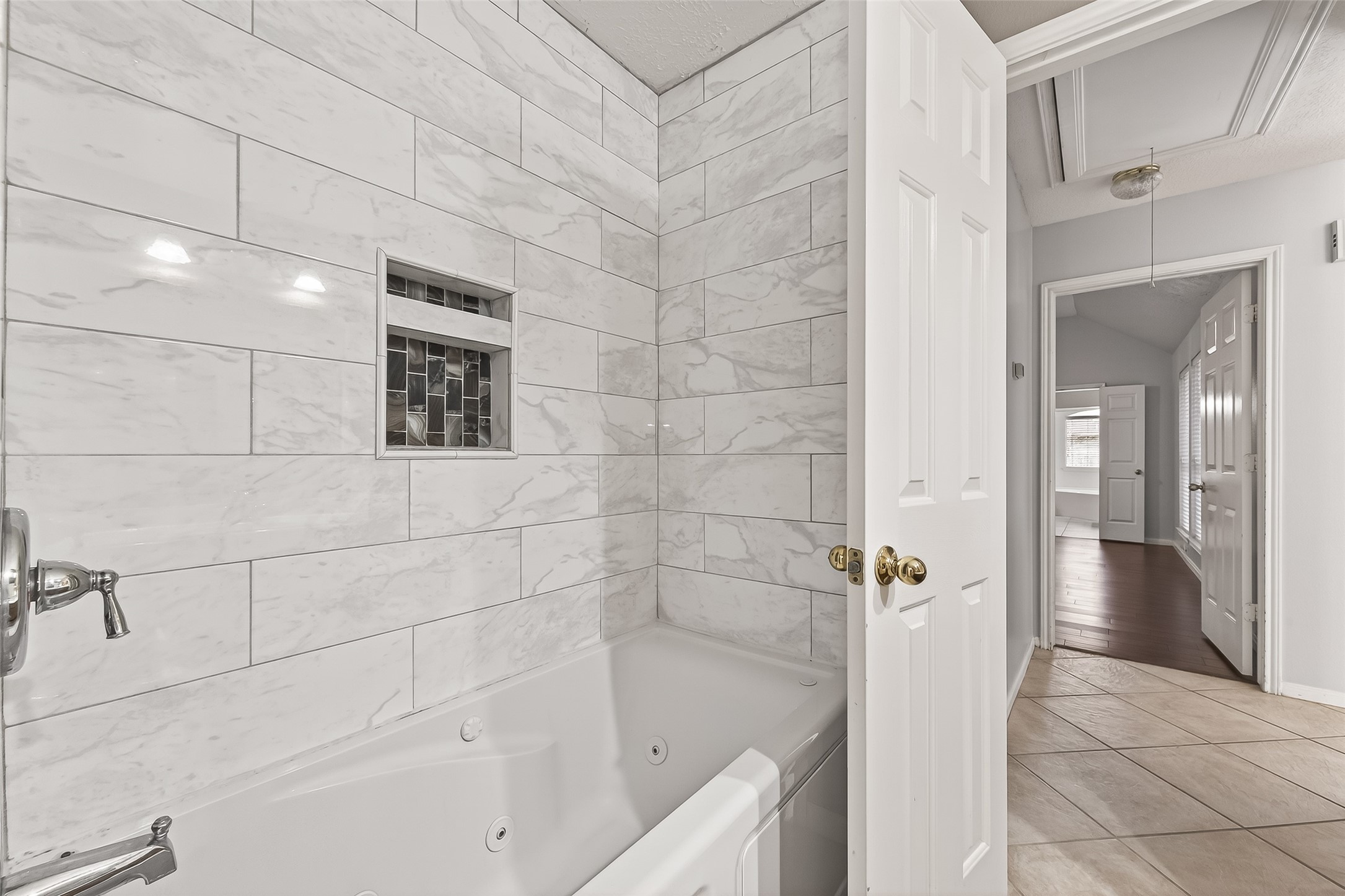 20839 Rivershire Lane Houston, TX 77073 - Photo 34 of 50 a bathroom with a bathtub