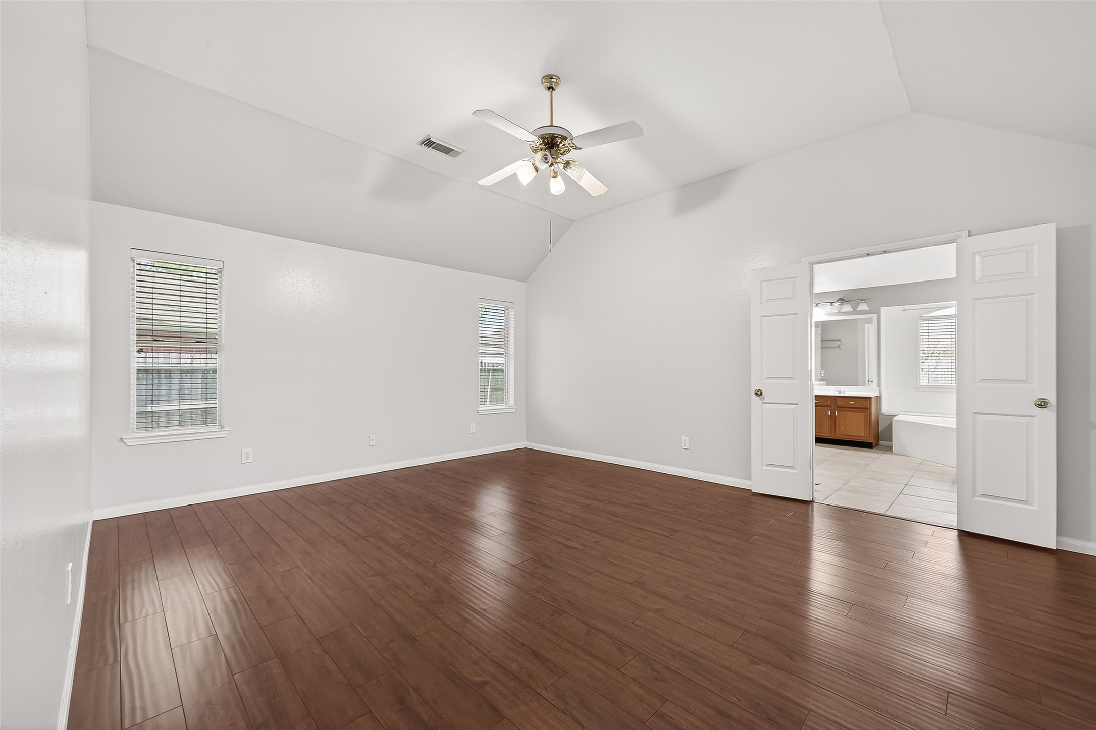20839 Rivershire Lane Houston, TX 77073 - Photo 38 of 50 wooden floor in an empty room with a window