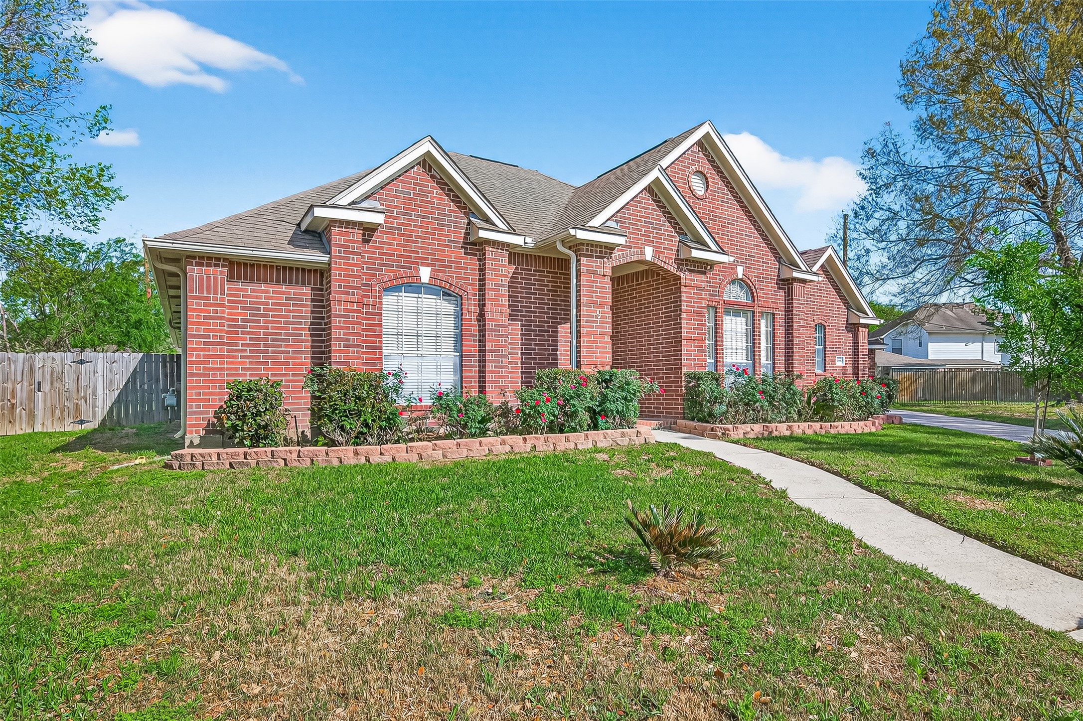 20839 Rivershire Lane Houston, TX 77073 - Photo 4 of 50 a front view of a house with a yard and garage