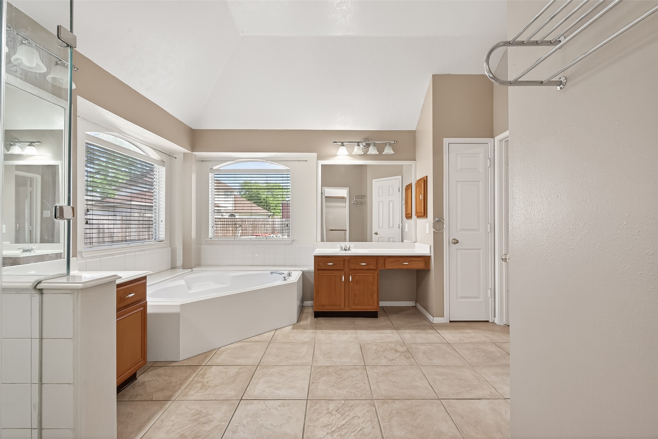 20839 Rivershire Lane Houston, TX 77073 - Photo 44 of 50 a large spacious bathroom with a tub shower and sink