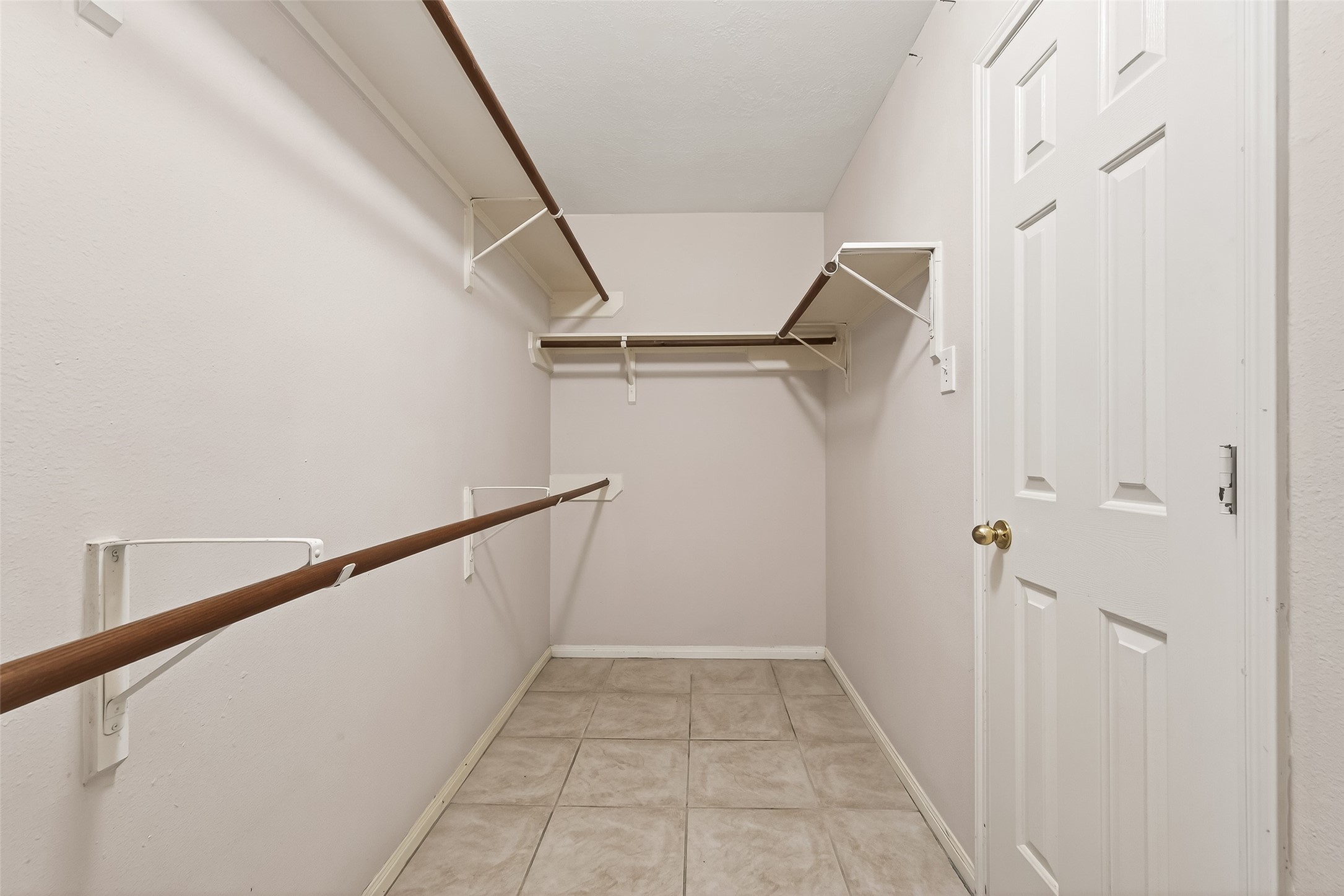 20839 Rivershire Lane Houston, TX 77073 - Photo 45 of 50 a view of hallway with stairs