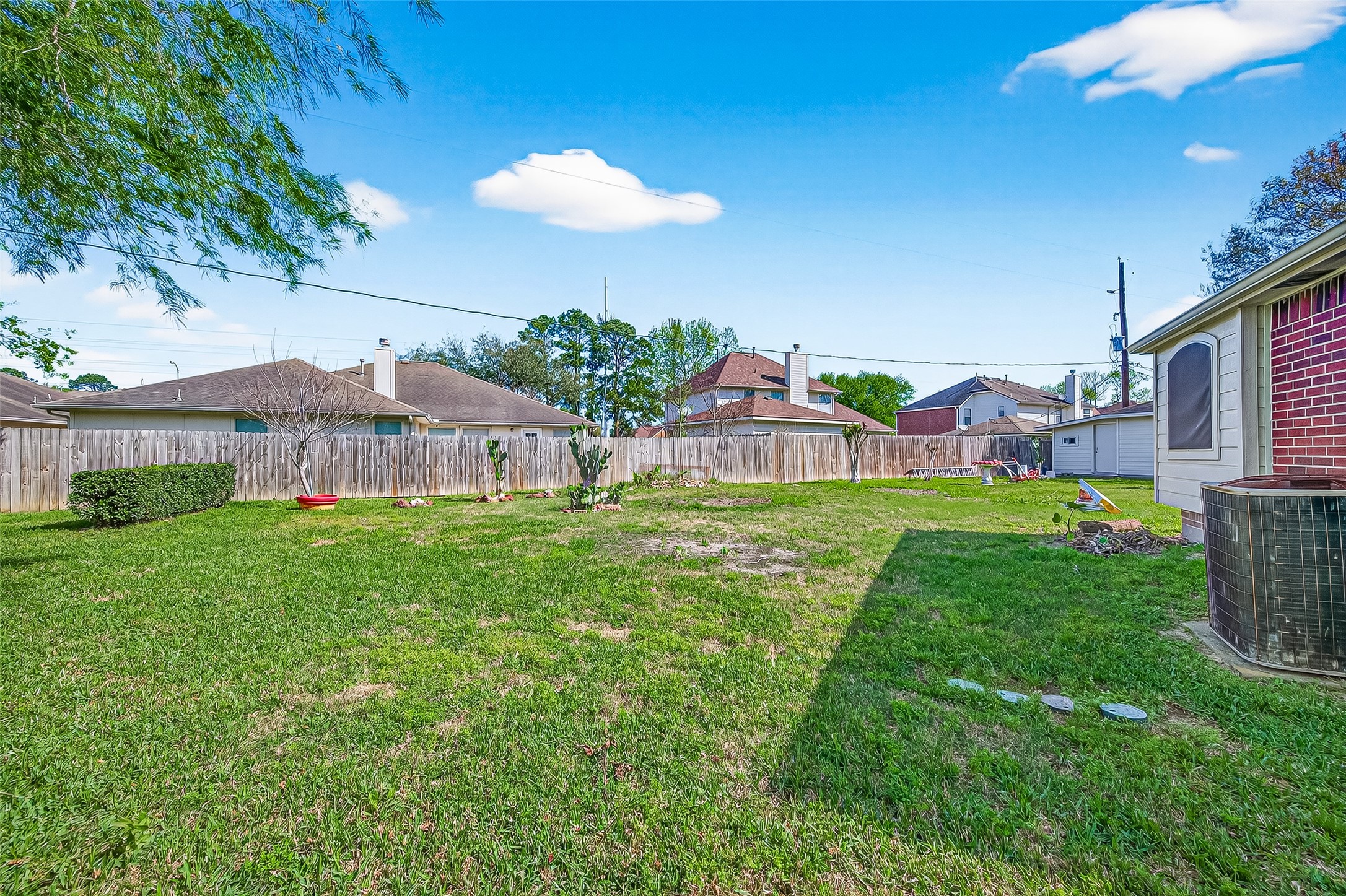 20839 Rivershire Lane Houston, TX 77073 - Photo 49 of 50 a view of an house with backyard space and garden