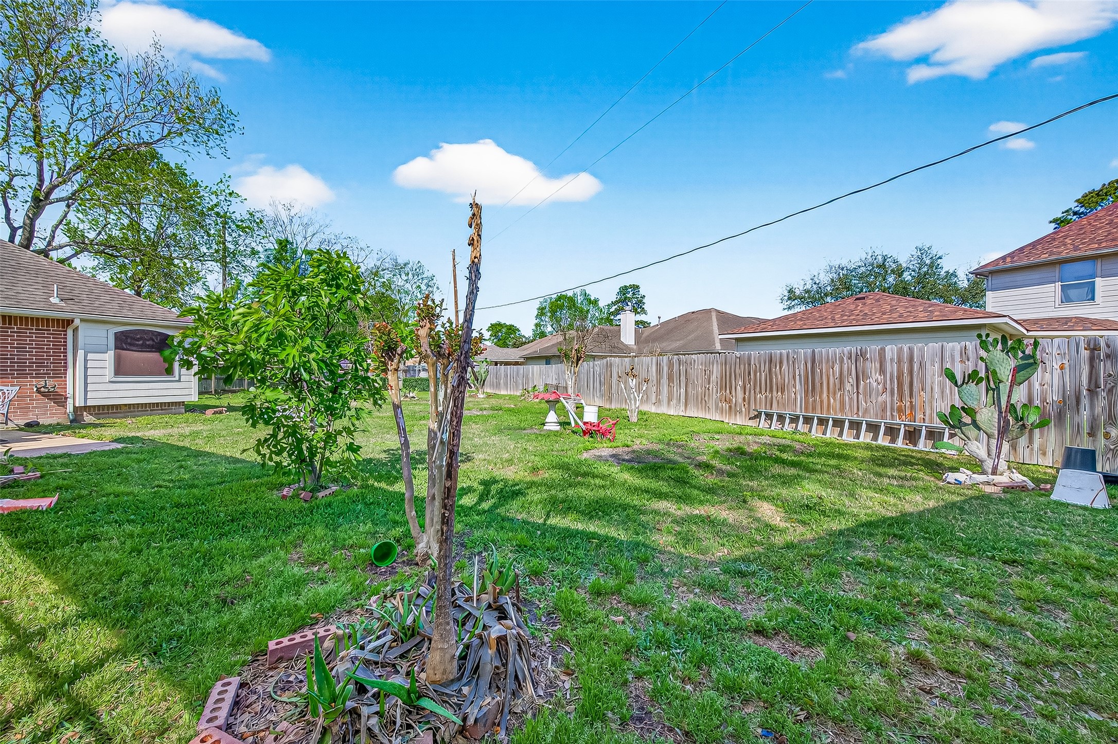 20839 Rivershire Lane Houston, TX 77073 - Photo 50 of 50 a view of a house with a yard and garden