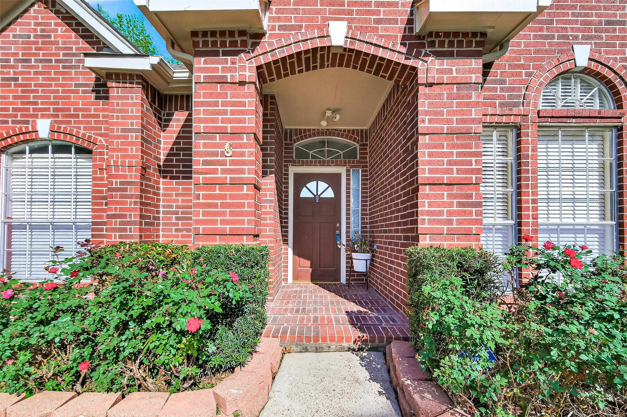 20839 Rivershire Lane Houston, TX 77073 - Photo 5 of 50 a front view of a house with a garden
