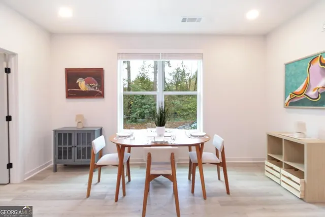 a workspace with furniture and a window