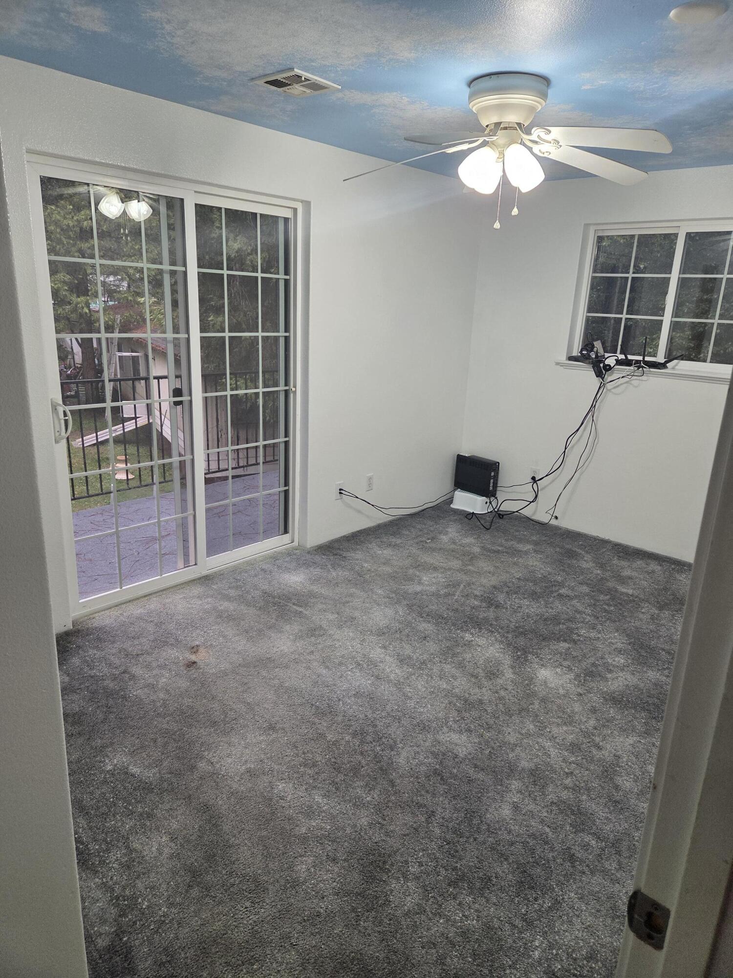 3760 Pleasant Creek Road Rogue River, OR 97537 - Photo 8 of 36 a view of empty room with windows