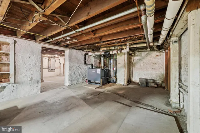 a view of a garage with wooden floors