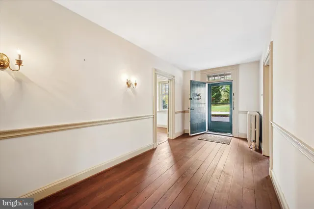 a view of a livingroom with wooden floor