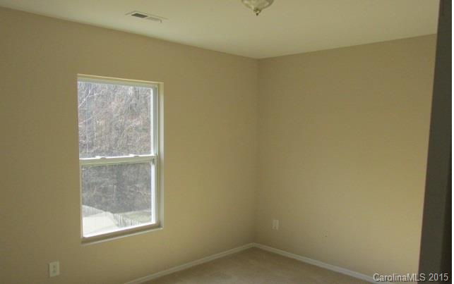 8808 Chalkstone Road Charlotte, NC 28216 - Photo 9 of 14 a view of a small space with window in it