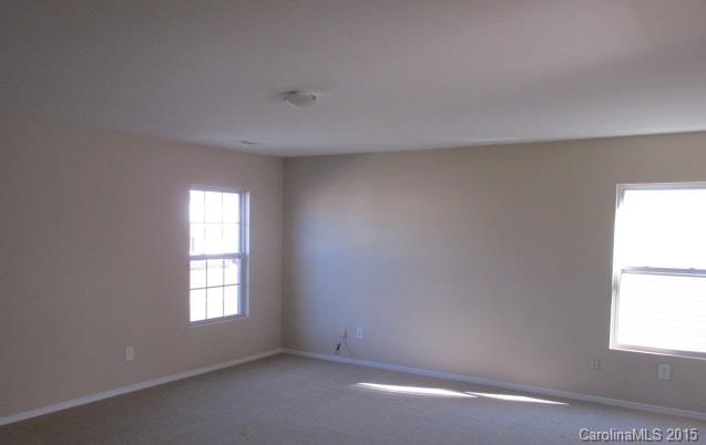 8808 Chalkstone Road Charlotte, NC 28216 - Photo 10 of 14 an empty room with a window
