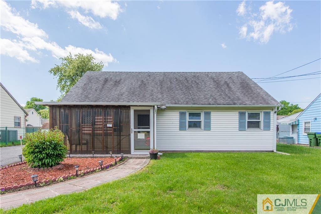 127 Idlewild Road Edison, NJ 08817 - Photo 2 of 21 a backyard of a house with seating space