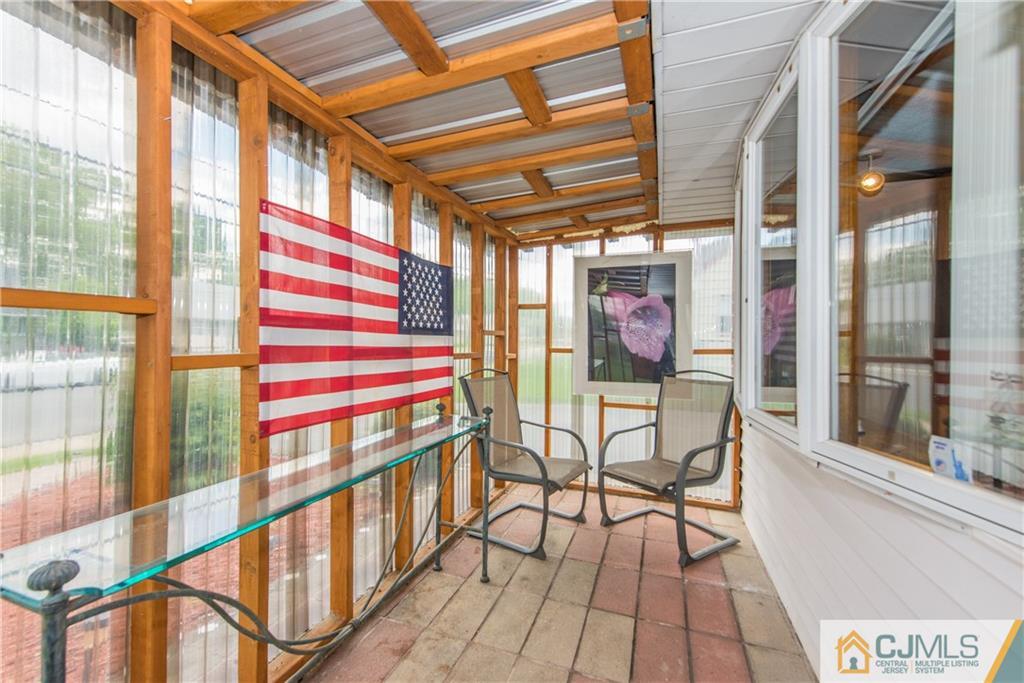 127 Idlewild Road Edison, NJ 08817 - Photo 18 of 21 a view of an outdoor space with seating area