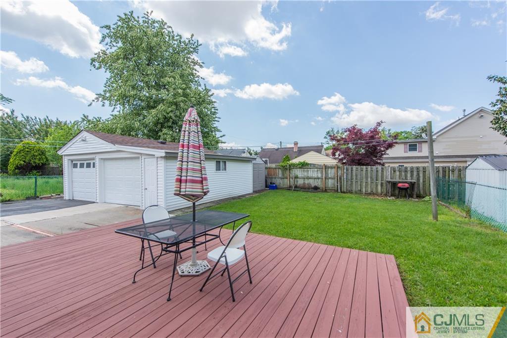 127 Idlewild Road Edison, NJ 08817 - Photo 19 of 21 a view of a house with backyard porch and sitting area