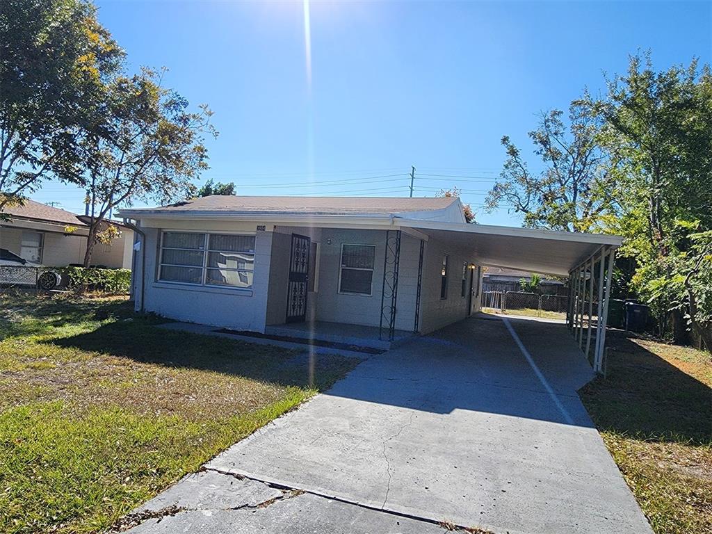 3904 West Walnut Street Tampa, FL 33607 - Photo 1 of 16 a front view of house with yard and green space
