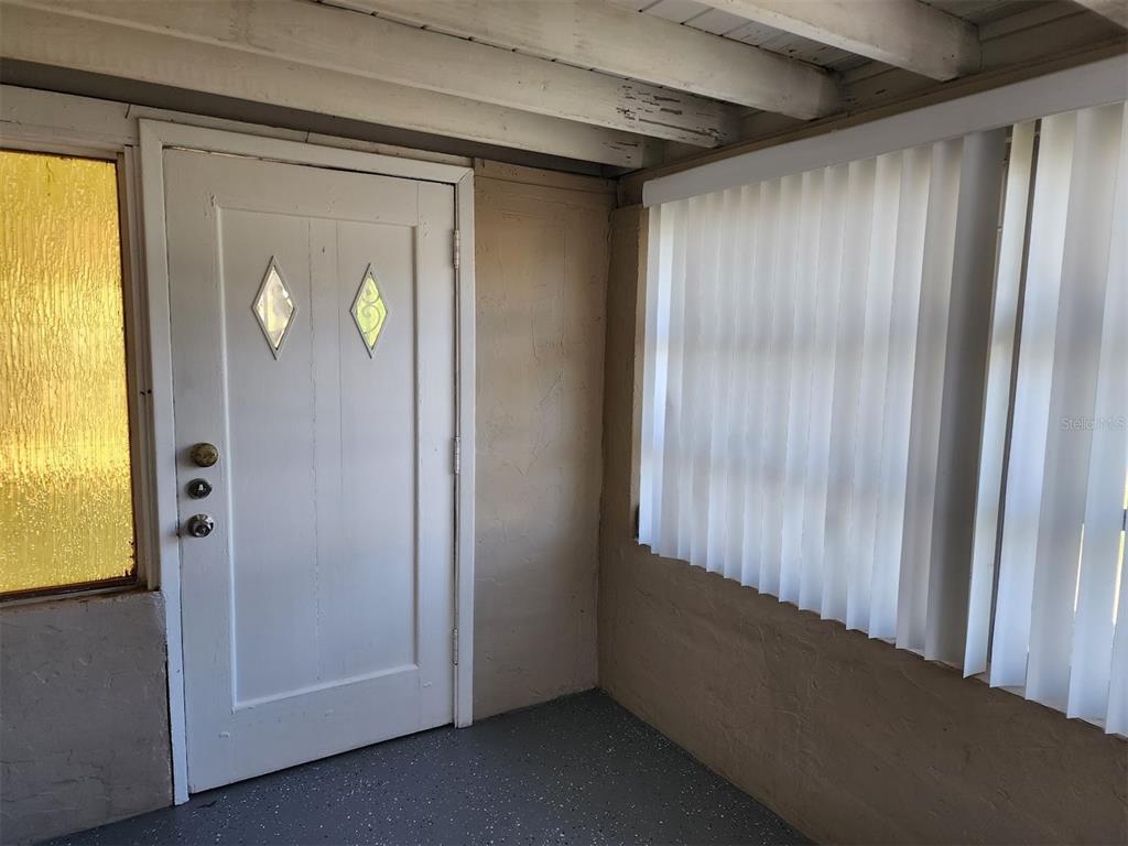 3904 West Walnut Street Tampa, FL 33607 - Photo 16 of 16 a view of an empty room with a window