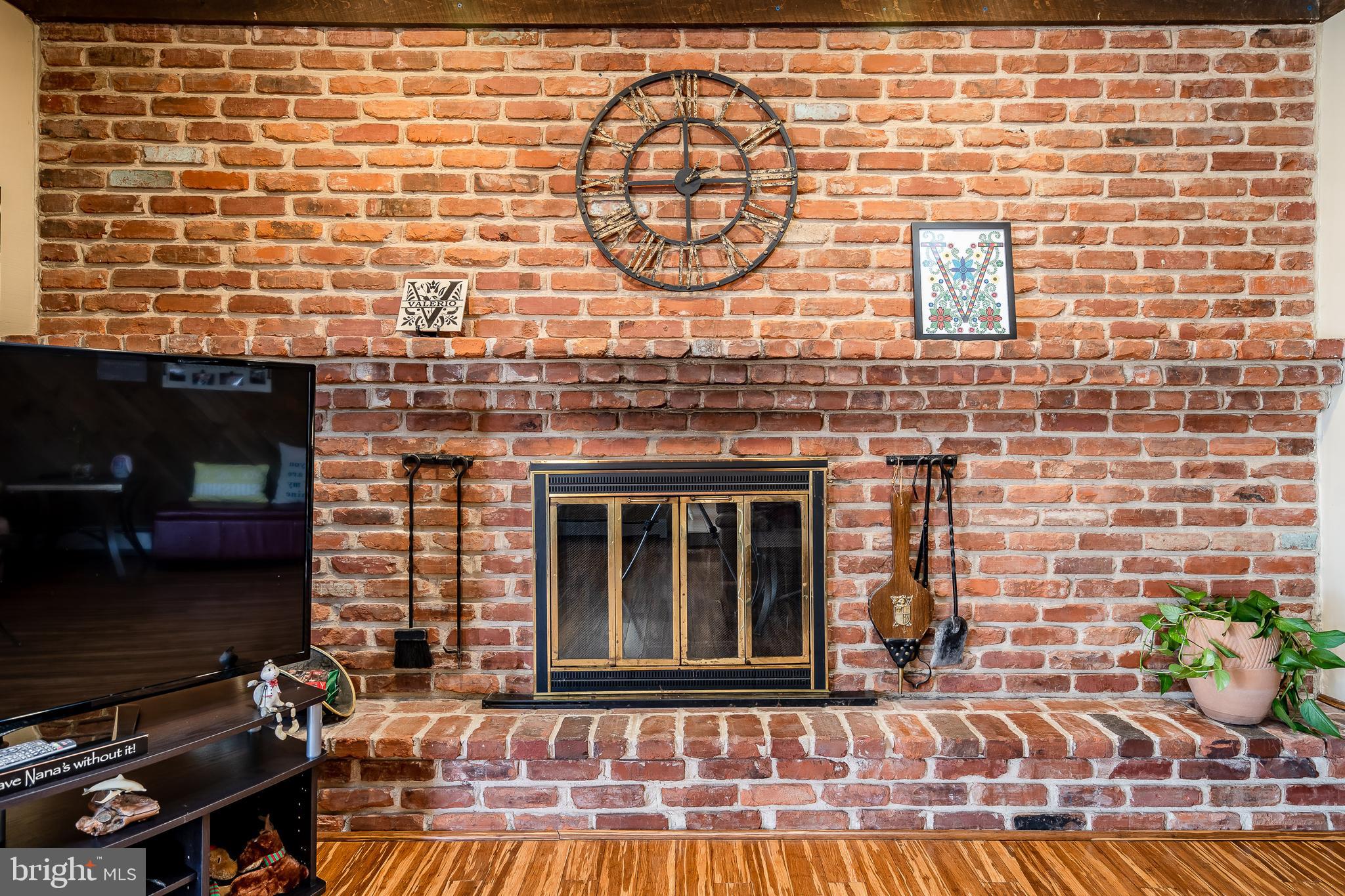 909 Fillmore Road East Norriton, PA 19403 - Photo 30 of 56 Full brick wall fireplace