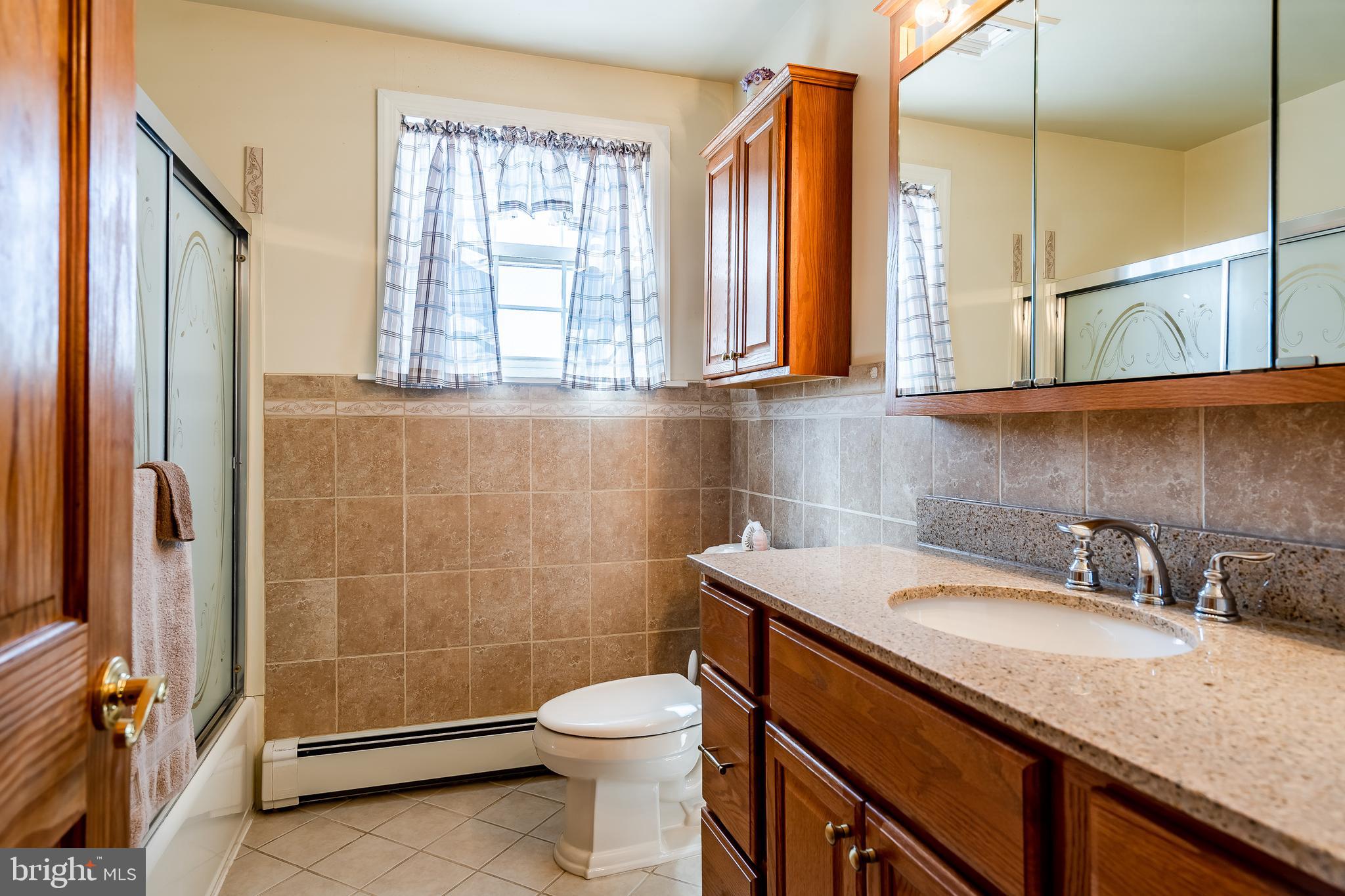 909 Fillmore Road East Norriton, PA 19403 - Photo 43 of 56 Remodeled hall bath