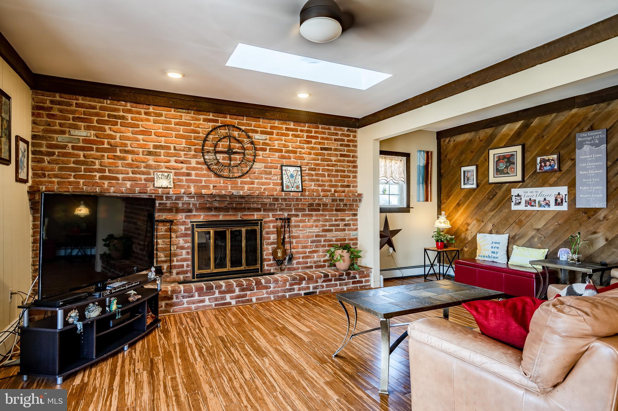 909 Fillmore Road East Norriton, PA 19403 - Photo 10 of 56 Cozy fireplace family room