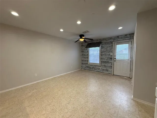 a open kitchen with a sink and a stove top oven