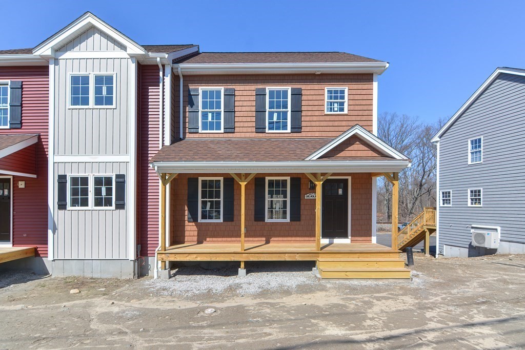 a view of a house with entrance gate