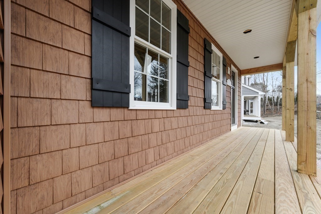 260 Main Street, Unit 3 Blackstone, MA 01504 - Photo 20 of 40 a view of a brick buildings with wooden floor