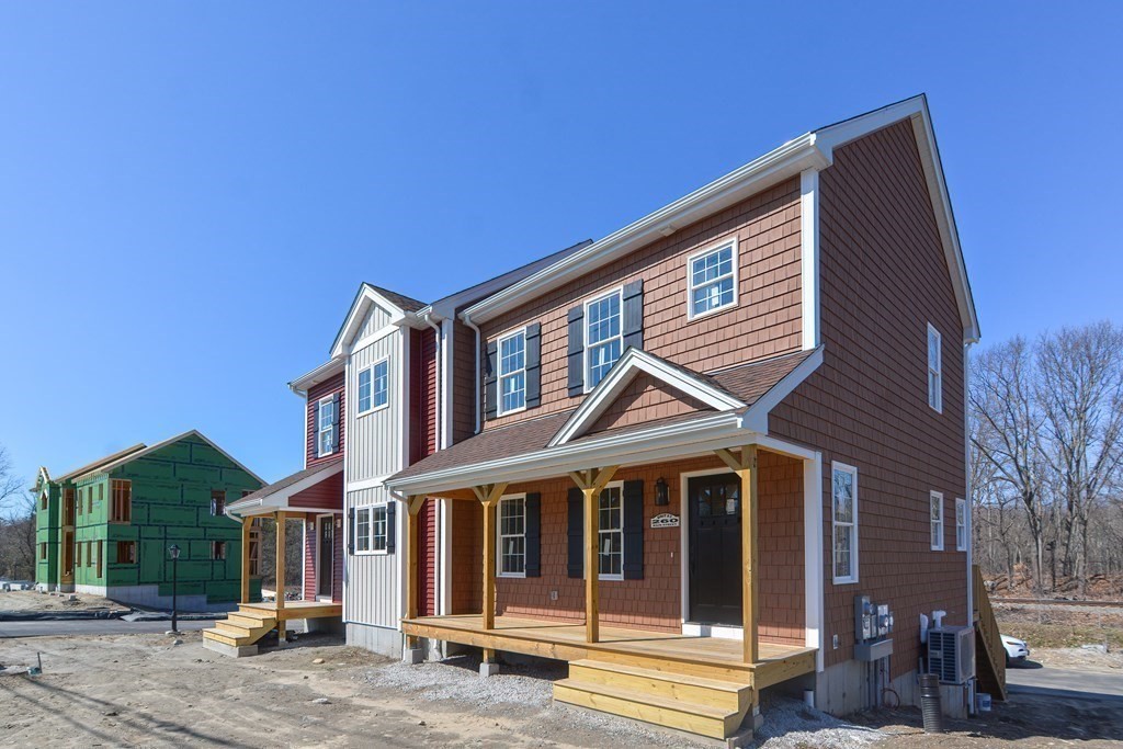 260 Main Street, Unit 3 Blackstone, MA 01504 - Photo 36 of 40 a view of a house with a large windows