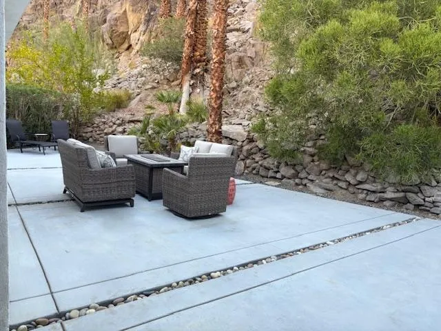 a outdoor living space with furniture and a couch