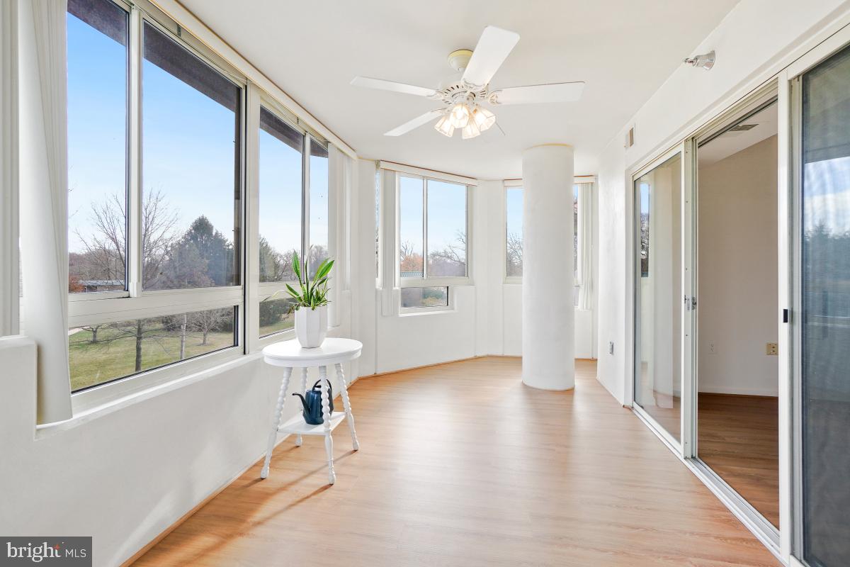 14801 Pennfield Circle, Unit 401 Silver Spring, MD 20906 - Photo 11 of 31 a view of an entryway with wooden floor and garden view