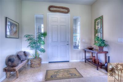 81249 Red Rock Road La Quinta, CA 92253 - Photo 11 of 25 a living room with furniture and potted plant
