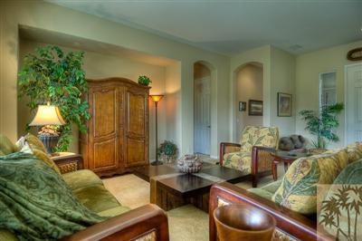 81249 Red Rock Road La Quinta, CA 92253 - Photo 14 of 25 a living room with furniture and a large window