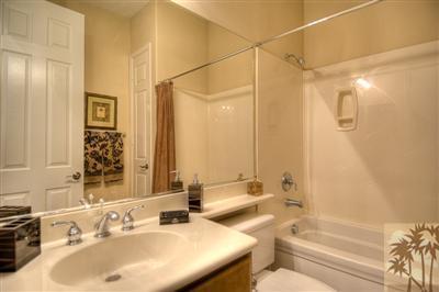 81249 Red Rock Road La Quinta, CA 92253 - Photo 17 of 25 a bathroom with a sink and a mirror