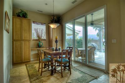 81249 Red Rock Road La Quinta, CA 92253 - Photo 8 of 25 a view of a dining room with furniture window and outside view