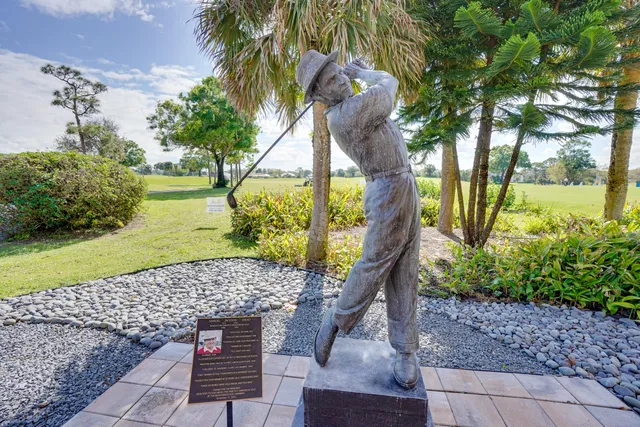 a view of a swimming pool with an outdoor space and seating area