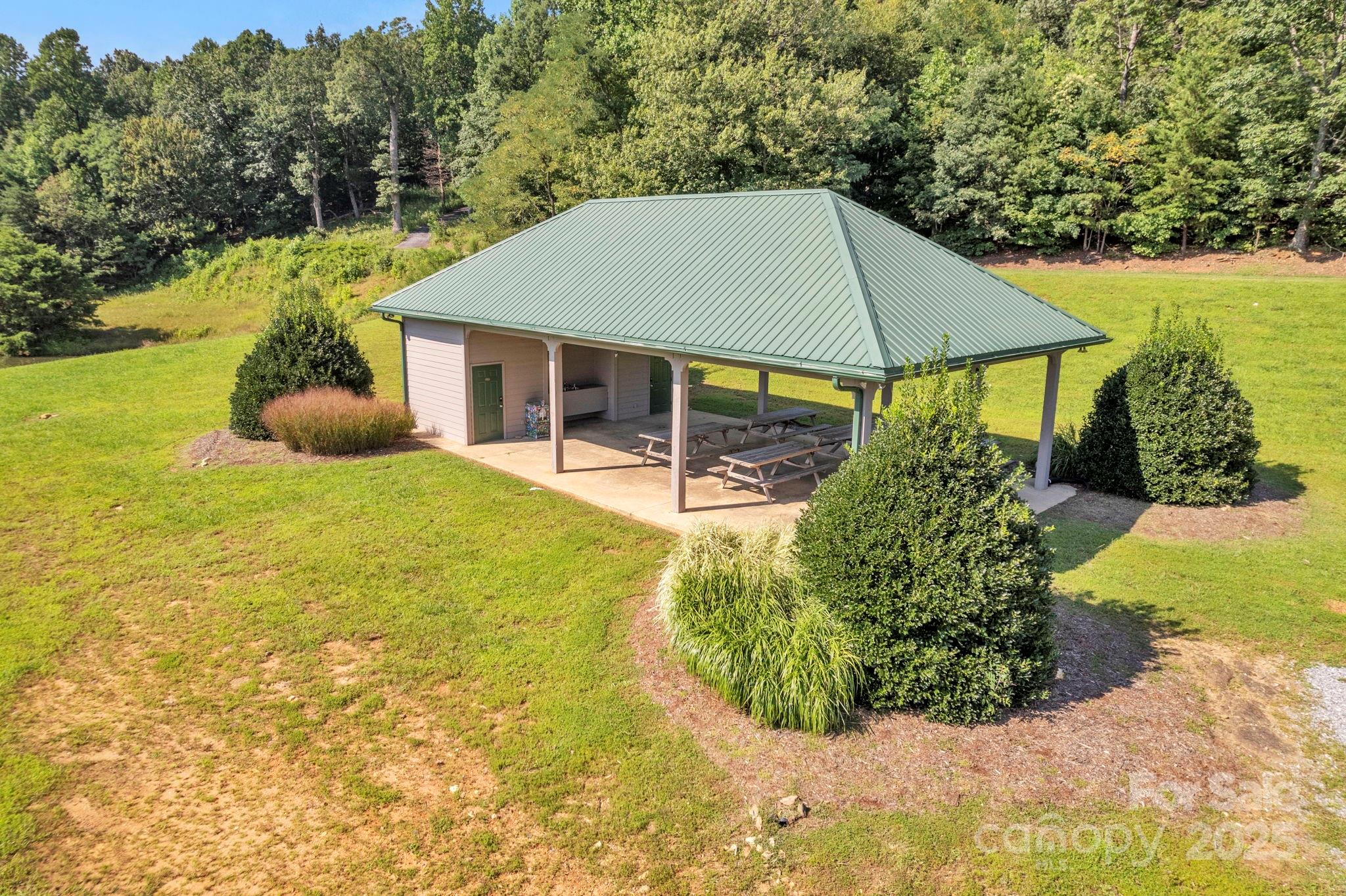 Lot 35 Morning Ride Drive, Unit LOT 35 Columbus, NC 28722 - Photo 6 of 10 a view of a house with pool and sitting area