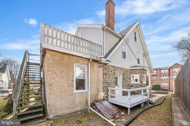a view of a patio with couches table and chairs