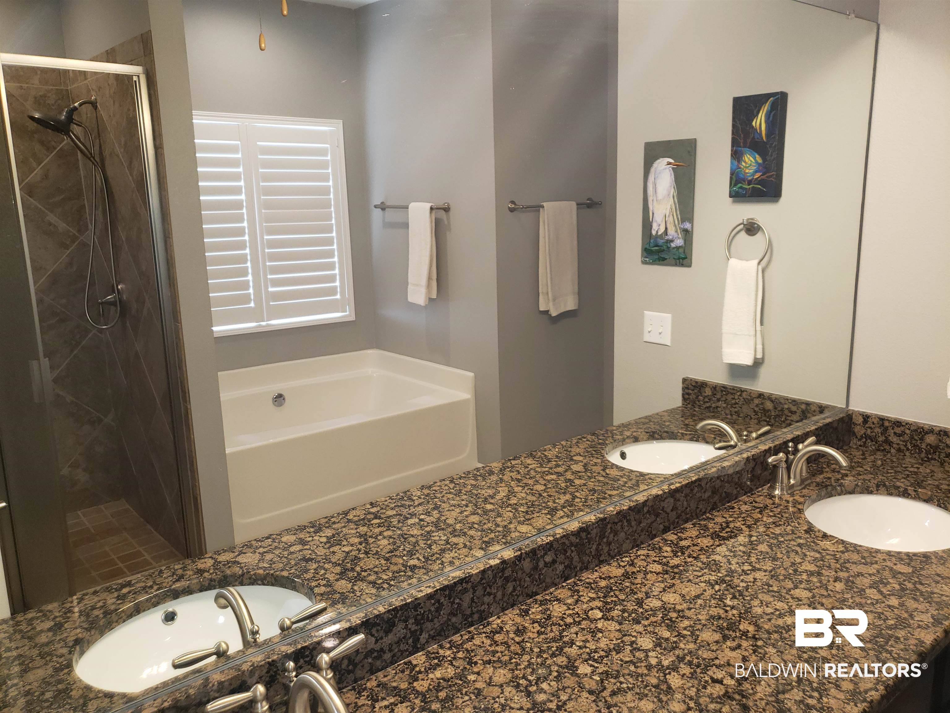 23373 Dundee Circle Foley, AL 36535 - Photo 15 of 34 Bathroom with double vanity and separate shower and tub