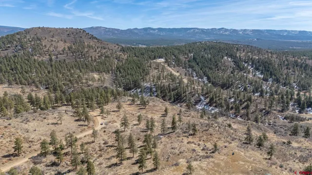 a view of a large mountain in the distance