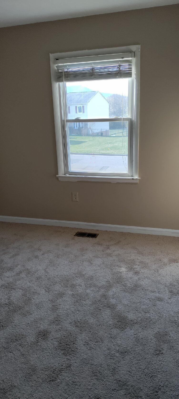 2317 Ranch Road Northwest Roanoke, VA 24017 - Photo 4 of 10 a view of an empty room with a window