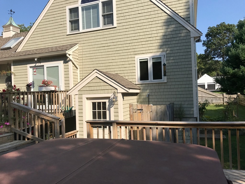 61 Whitmar Road Barnstable, MA 02635 - Photo 22 of 25 a view of a house with a deck
