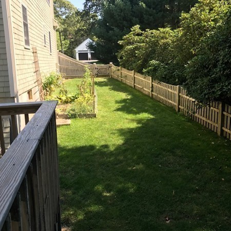 61 Whitmar Road Barnstable, MA 02635 - Photo 25 of 25 a view of a house with backyard and sitting area