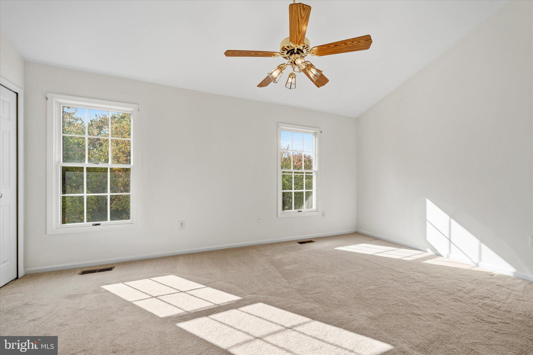 7849 Sabre Court Manassas, VA 20109 - Photo 17 of 35 a view of an empty room with a window