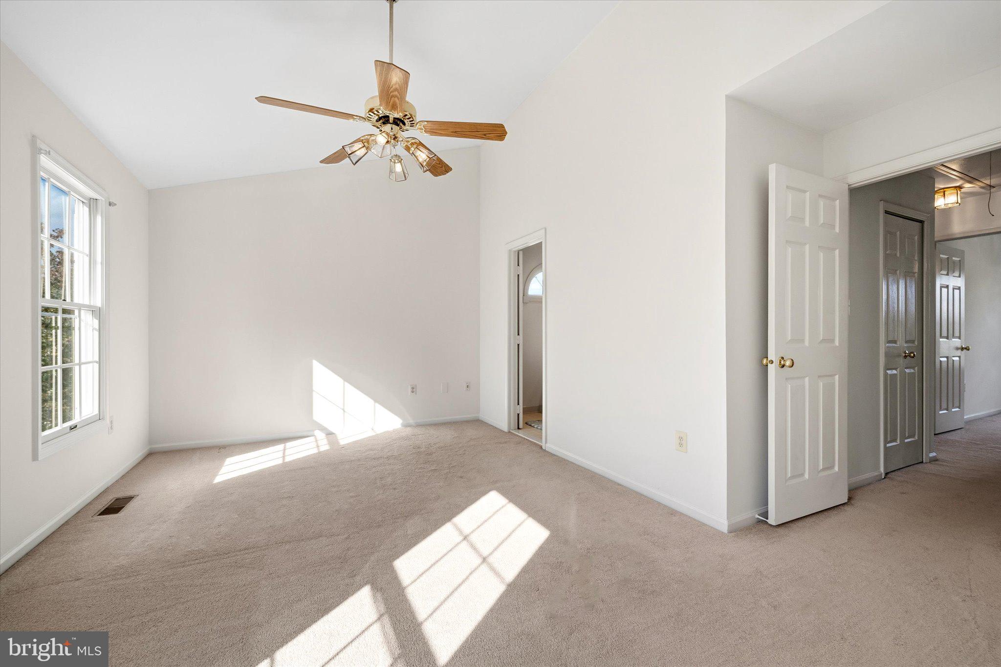 7849 Sabre Court Manassas, VA 20109 - Photo 18 of 35 a view of a livingroom with a ceiling fan and window