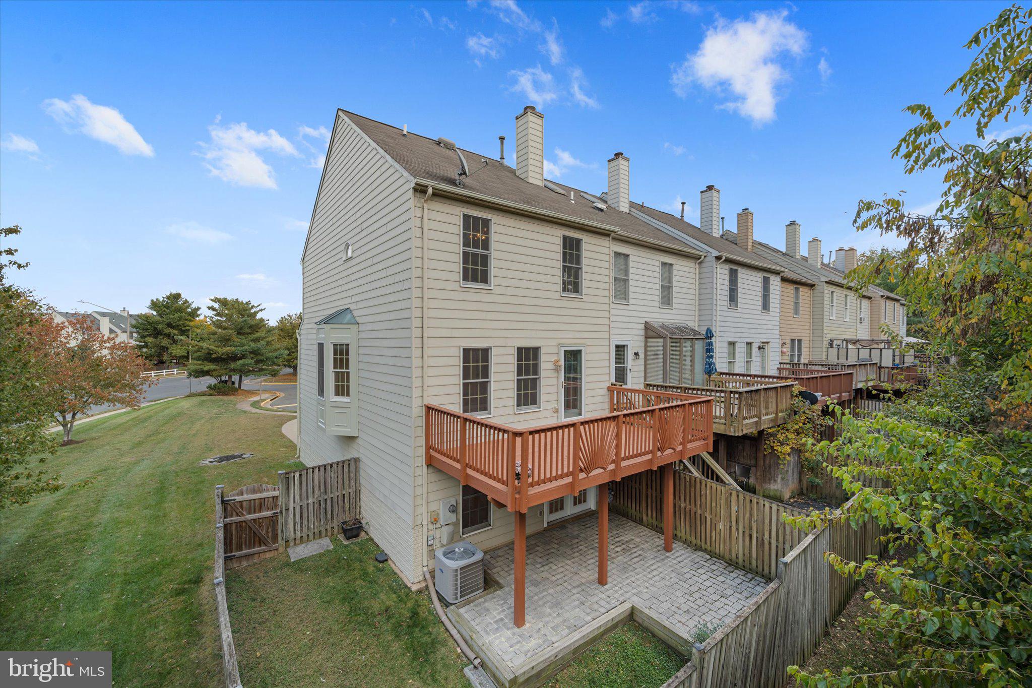 7849 Sabre Court Manassas, VA 20109 - Photo 30 of 35 a balcony with a table and chairs